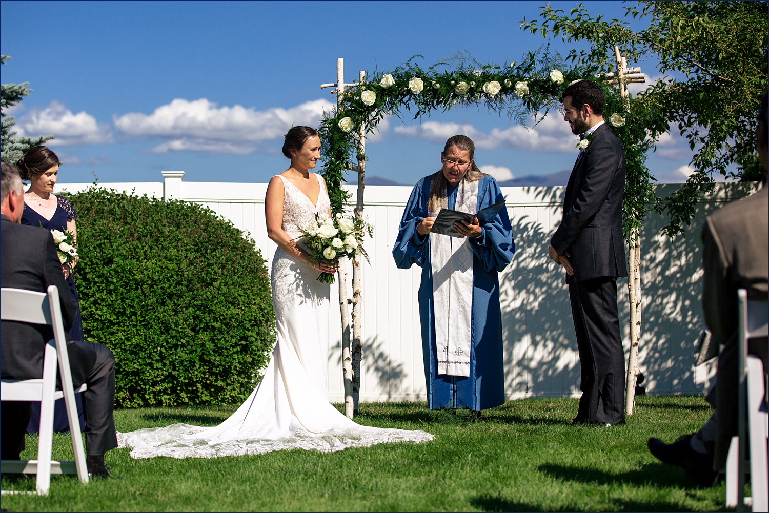 The wedding ceremony of the garden at Mountain View Grand Resort in New Hampshire overlooking the mountains