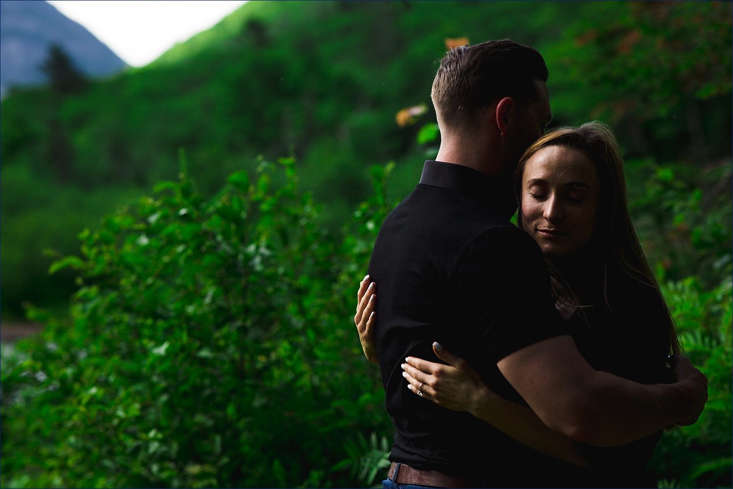 Warm embrace of the couple in New Hampshire engagement session