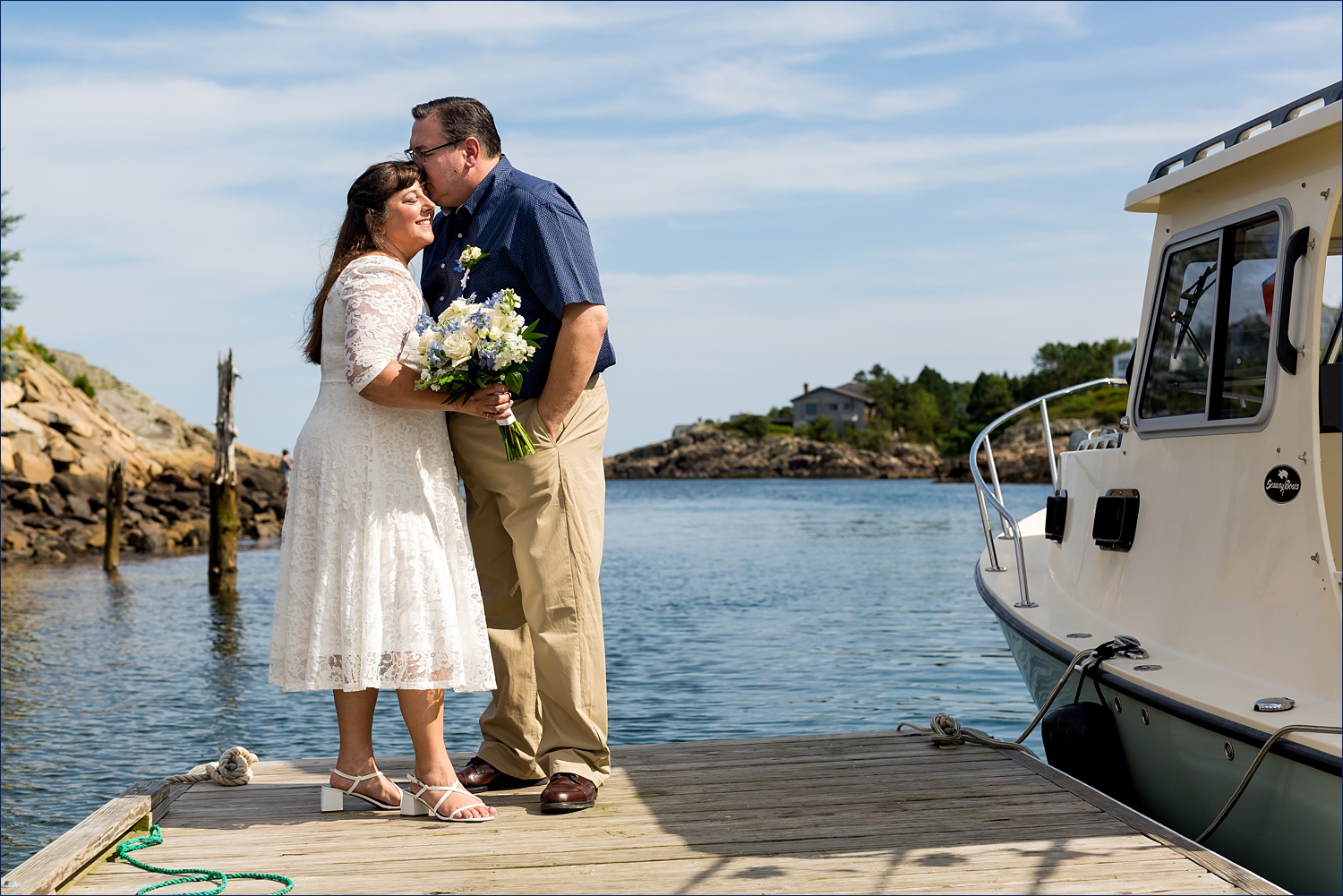 Out on the docks at Perkin's Cove before they elope in Maine