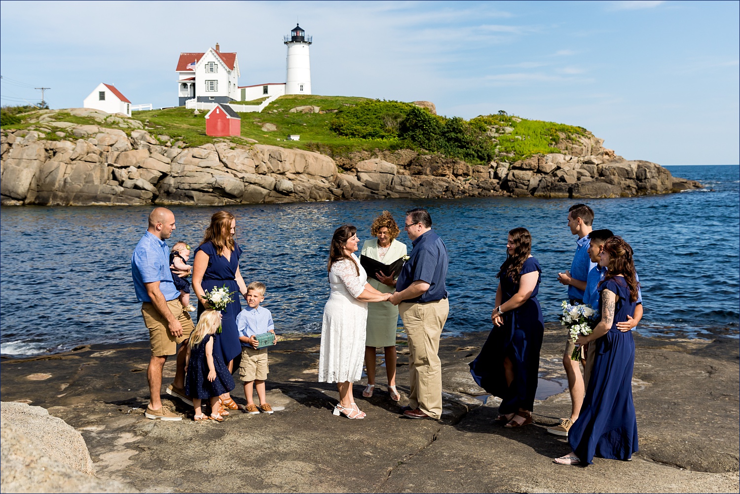 The intimate elopement on the water in York Maine by Nubble Light