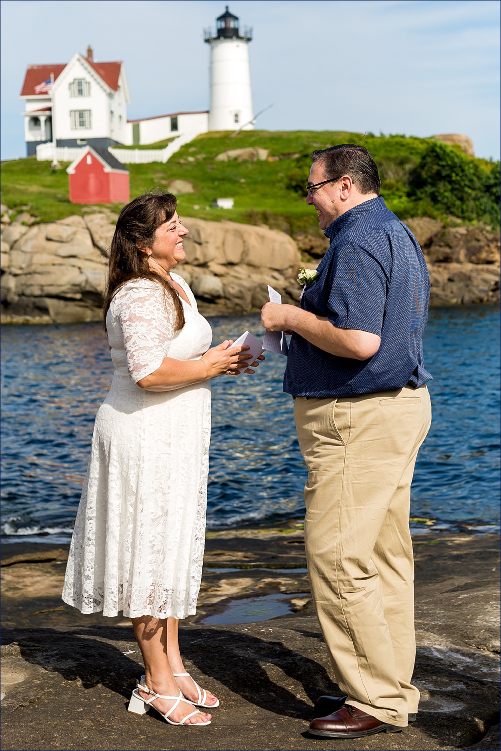 The couple reads their vows at their southern Maine elopement on the water in York Maine