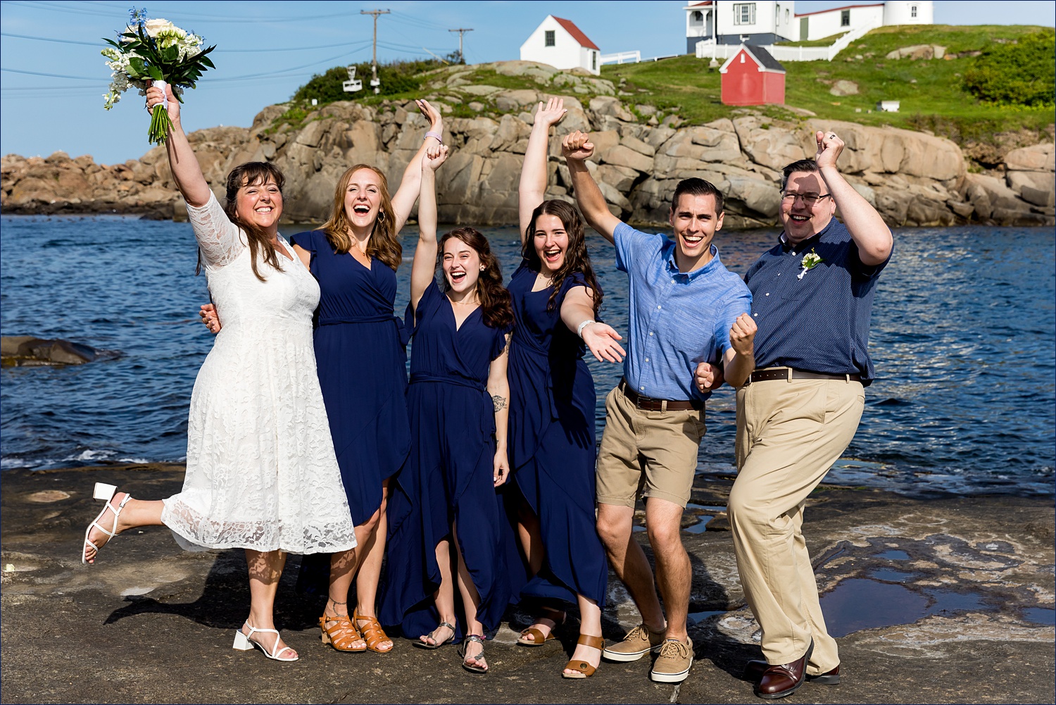 The couple and their kids celebrate their elopement out on the water at Nubble Light in York