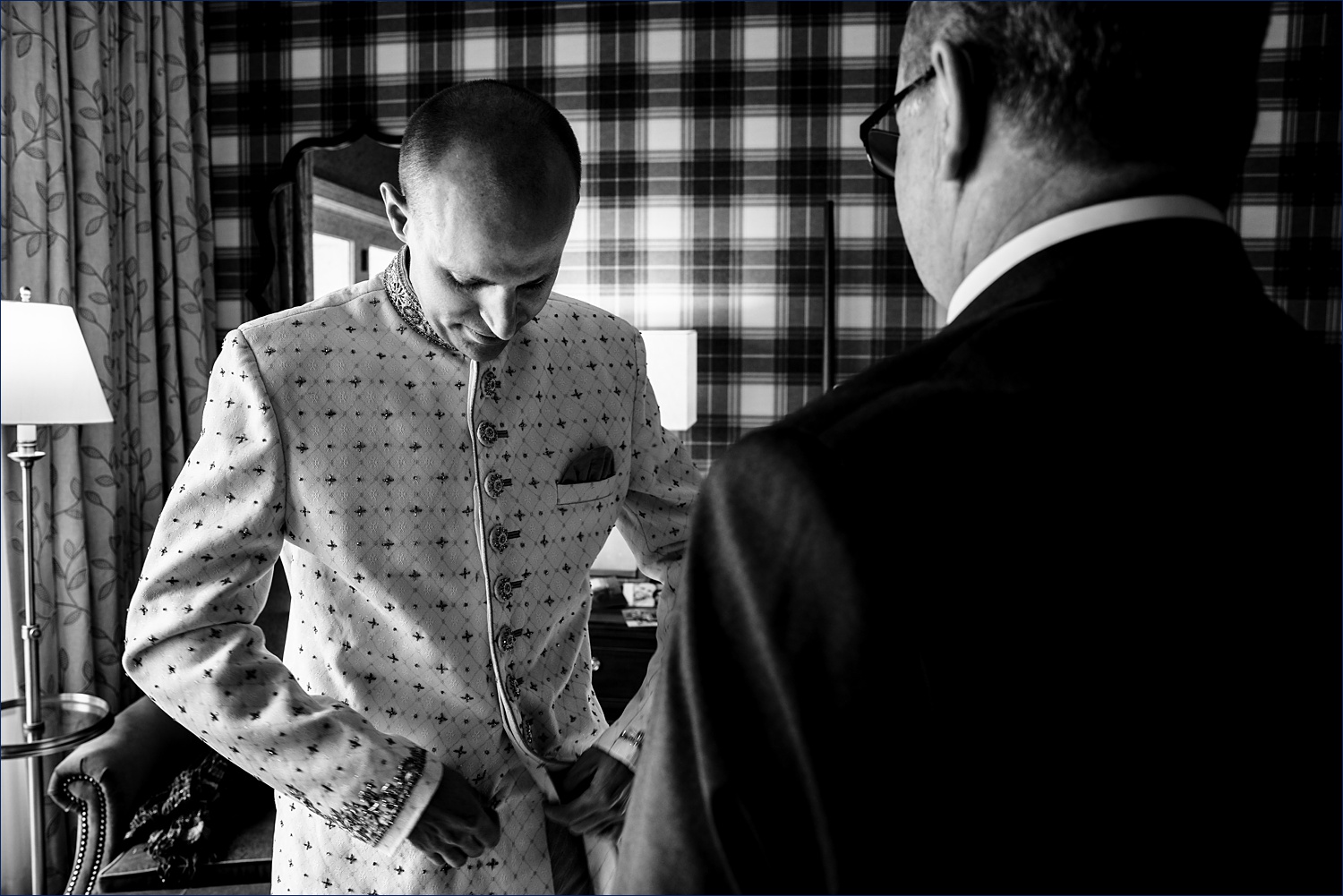 The groom gets ready for the wedding ceremony in NH