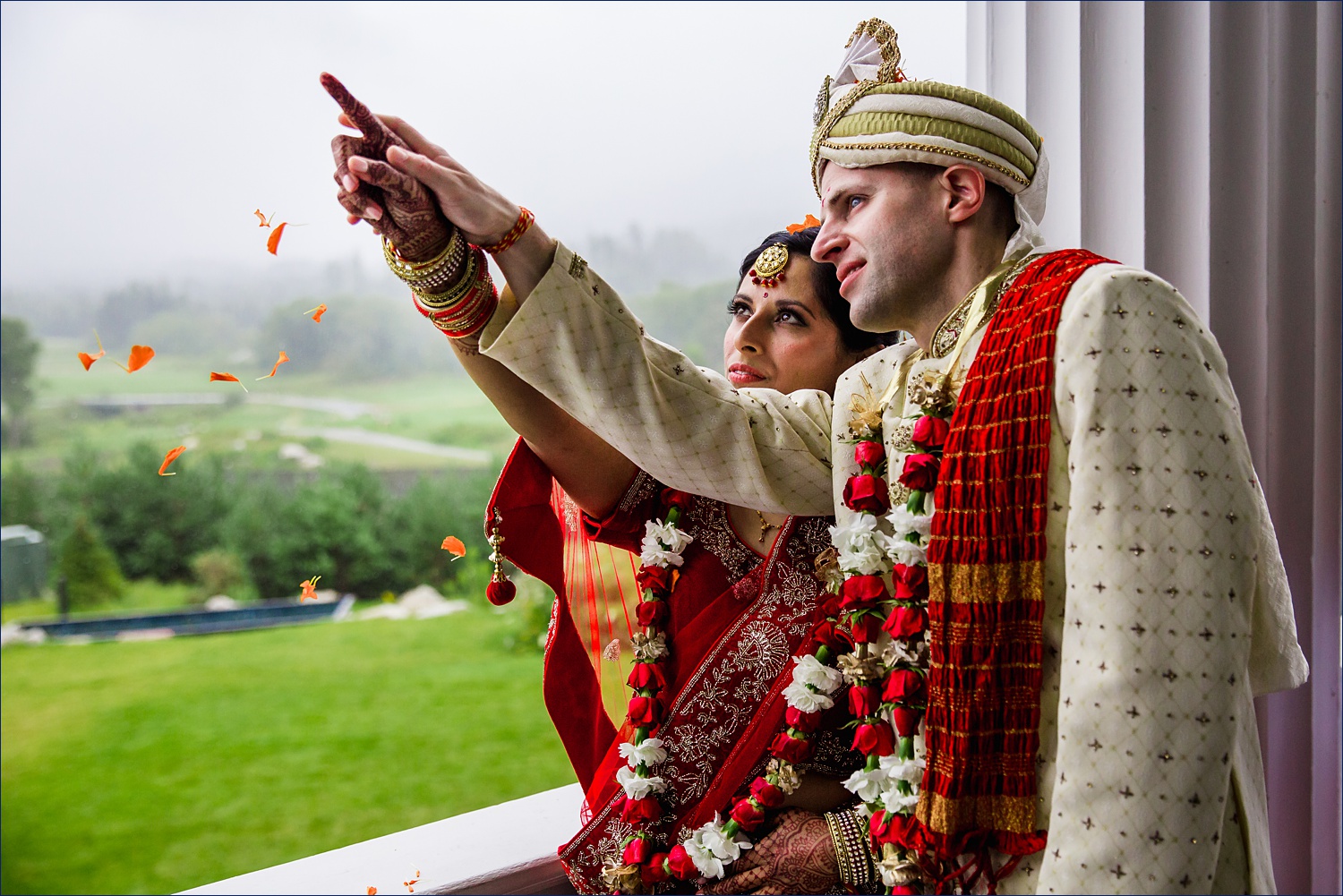 Arundhati and Druv Nakshatra the bride and groom point to the north star at their Hindu wedding ceremony