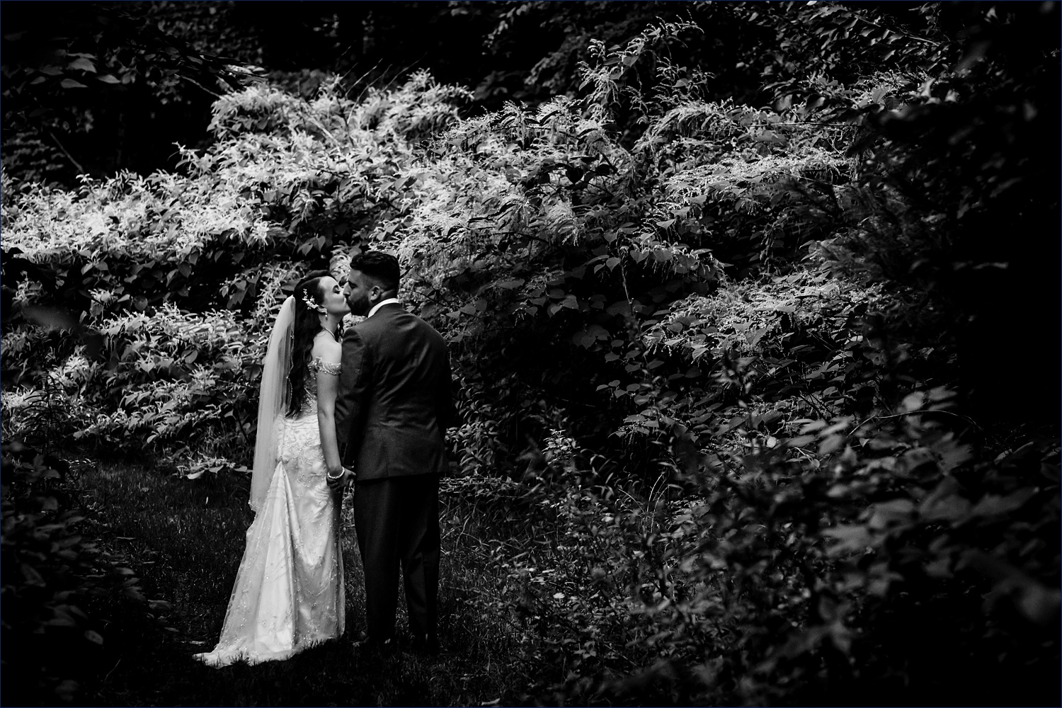A kiss to seal the deal on their wedding day in NH