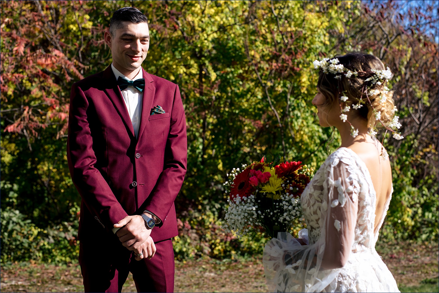 The bride and groom in their fall elopement ceremony