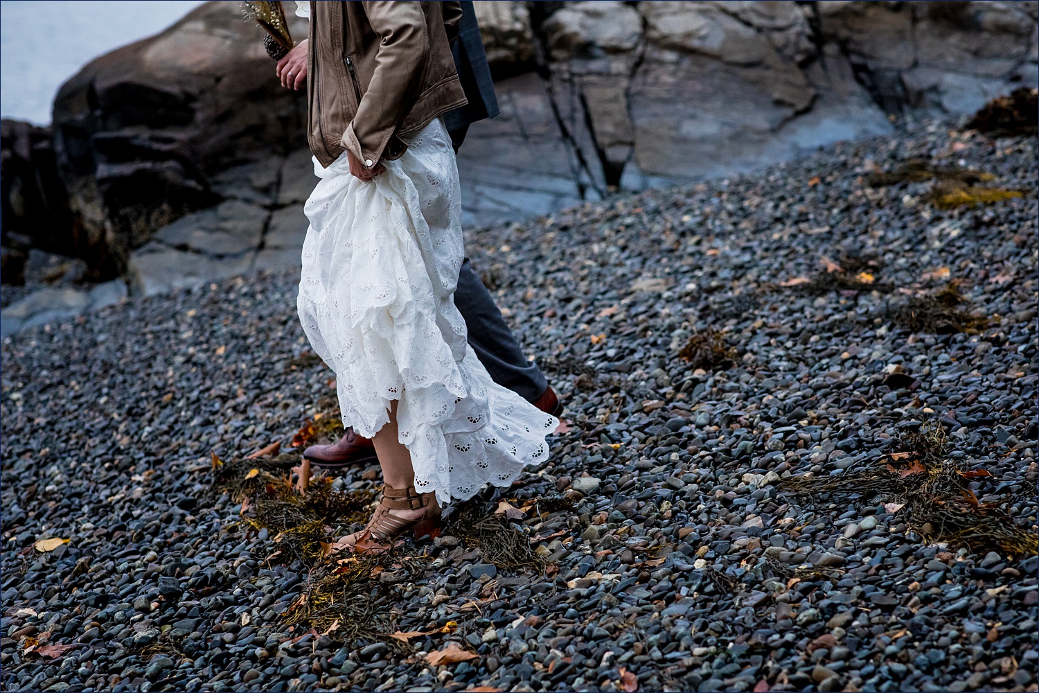 The rocky Maine coastline on their wedding day