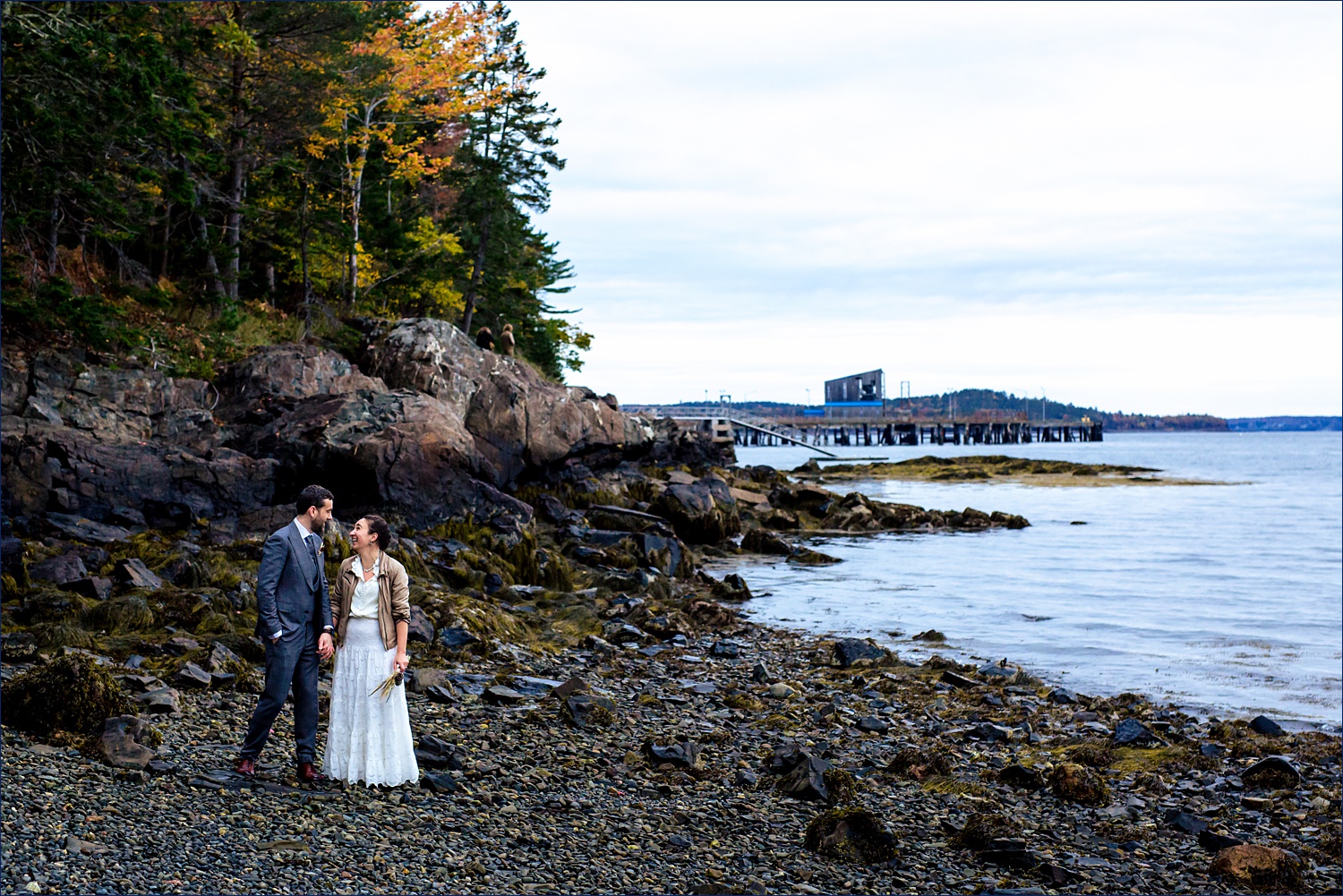 The newlyweds on the rocky beaches of Bar Harbor Maine on their wedding day