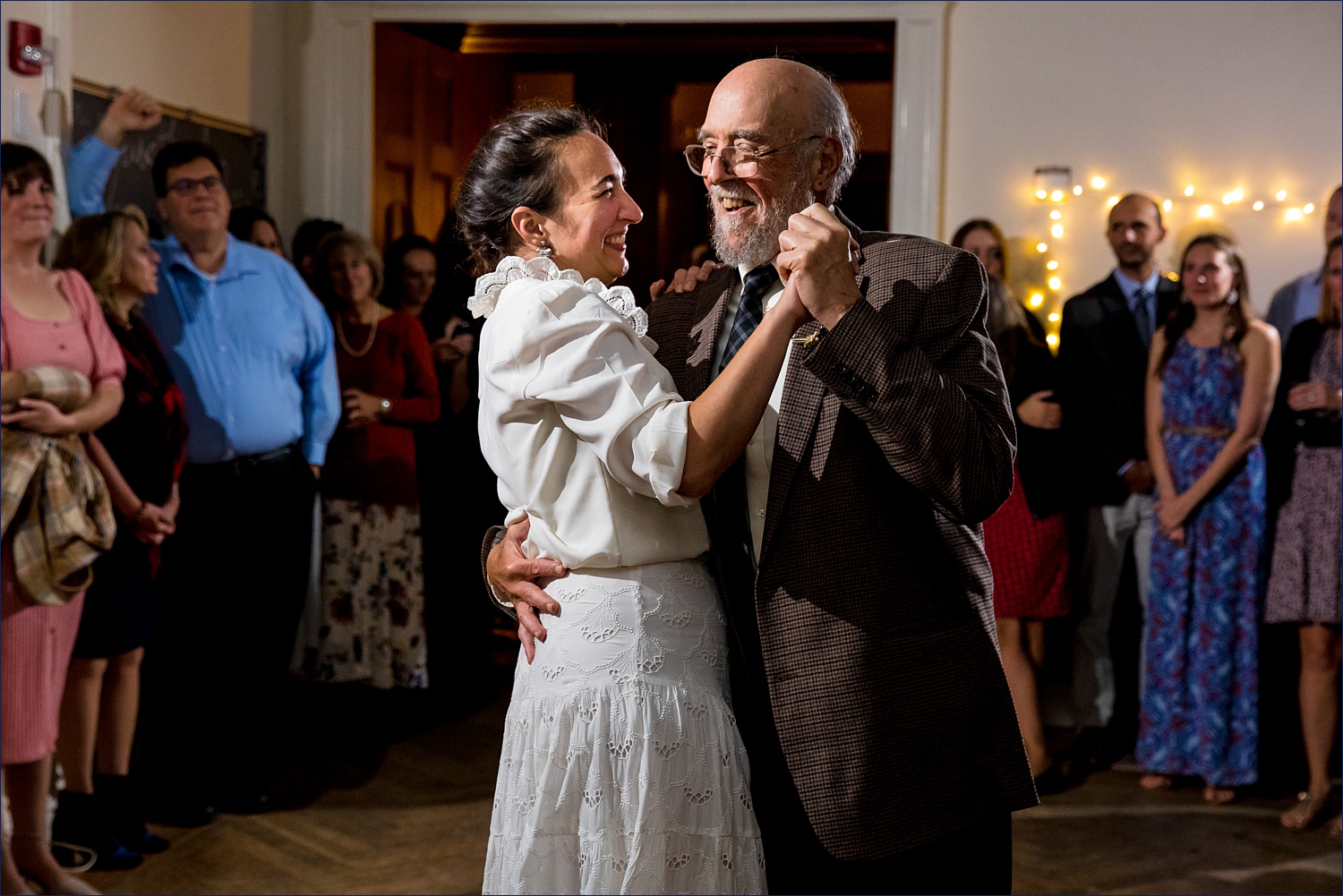 Bride and father dance at the wedding reception at College of the Atlantic