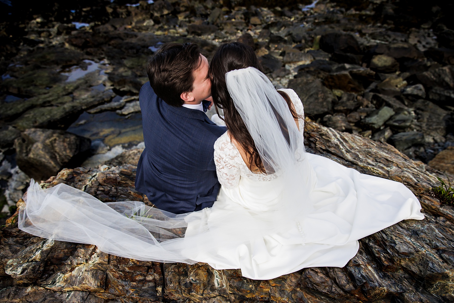 A kiss while lounging on the rocks of Ogunquit Maine