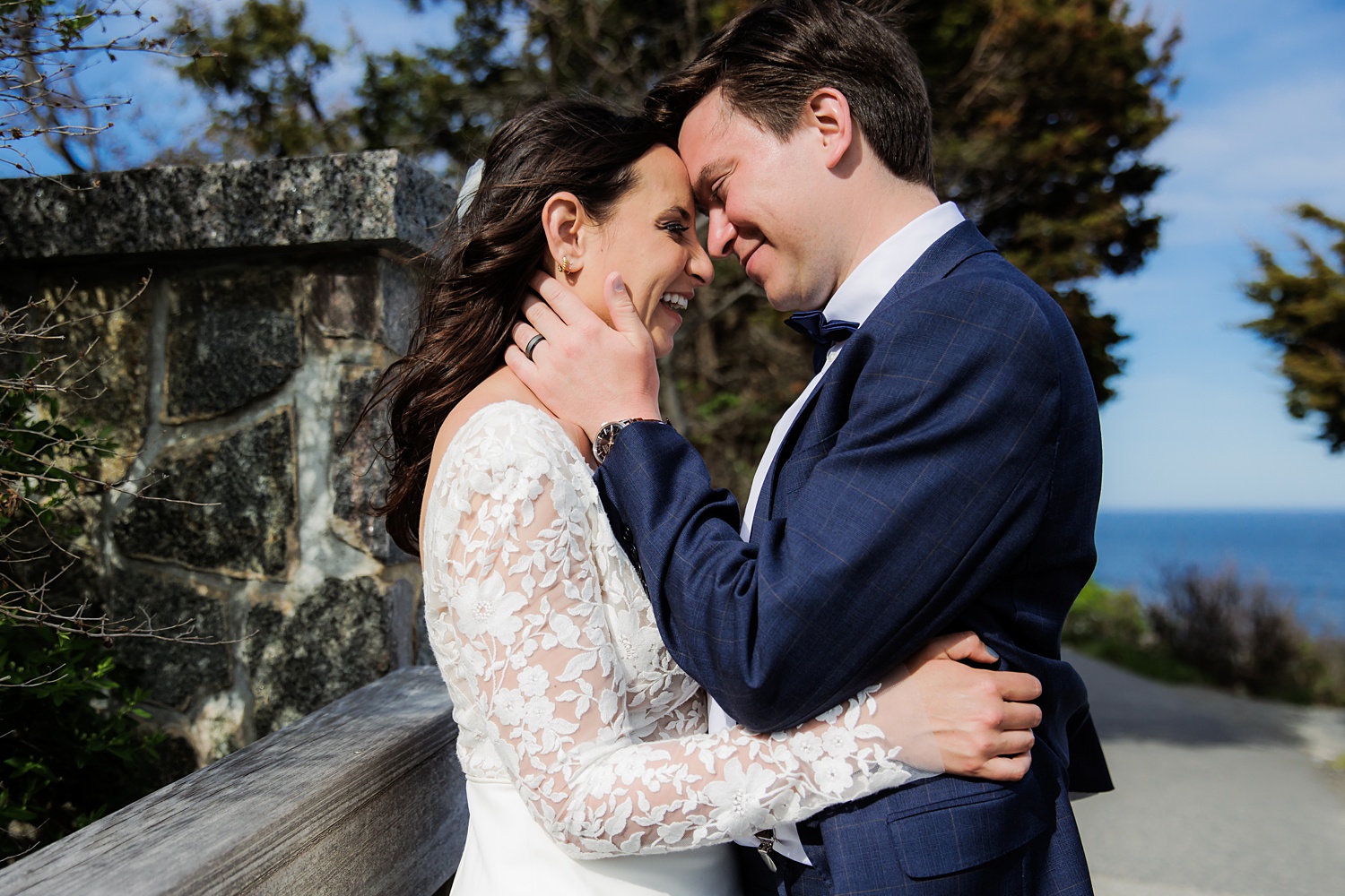 The couple can't stop smiling after a sunny Maine elopement