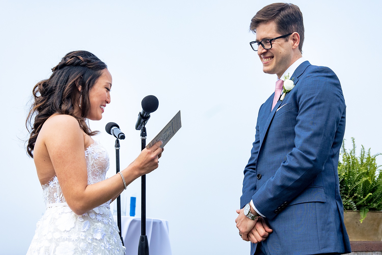 Sharing a moment of smiles during the reading of the vows