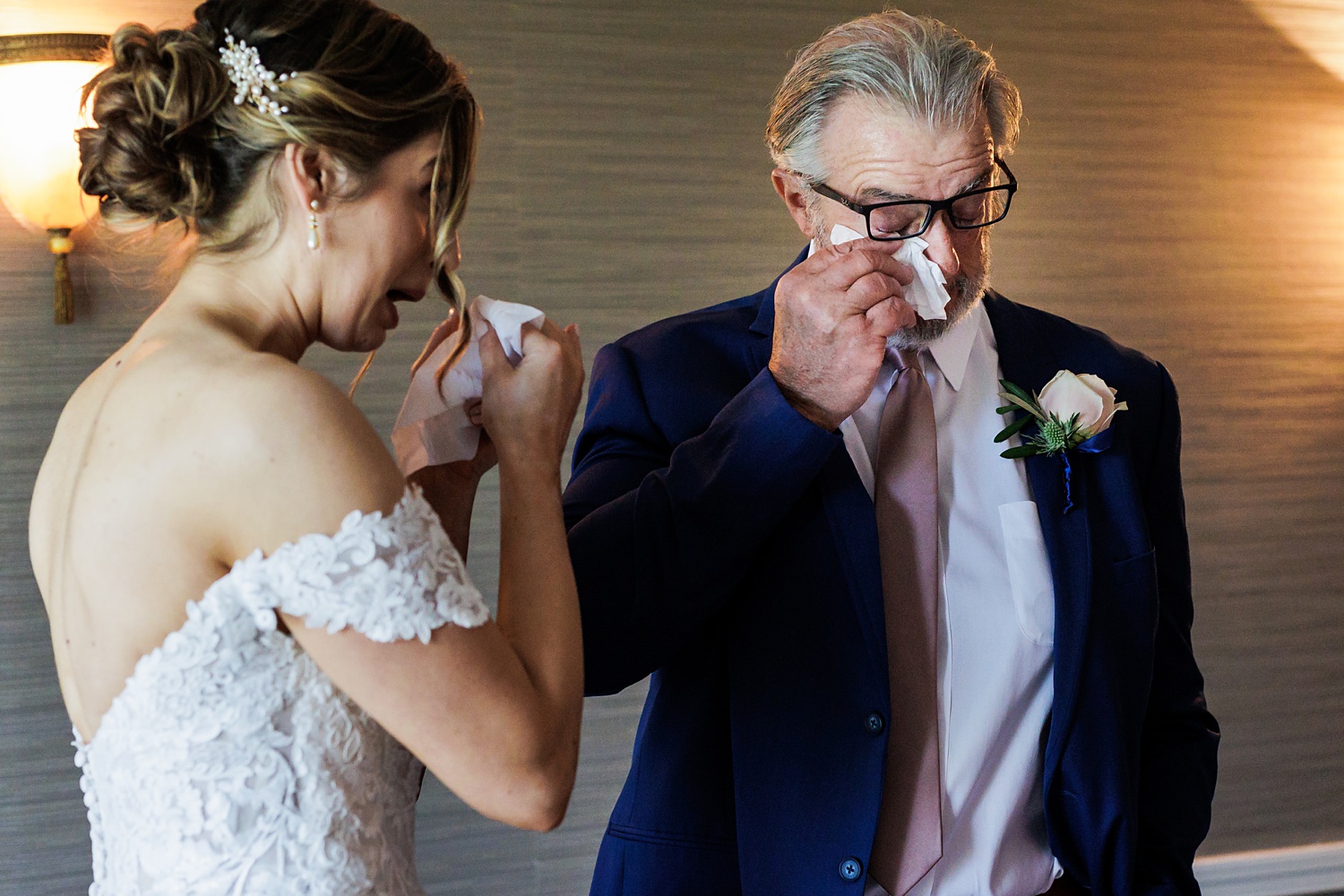 Tears as the father of the bride sees his daughter on her wedding day 