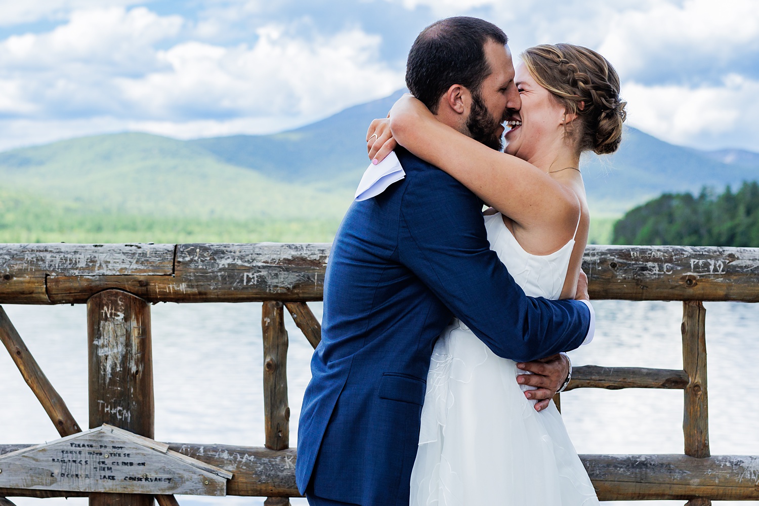 Kissing on the bridge overlooking Mt Chocorua in New Hampshire White Mountains
