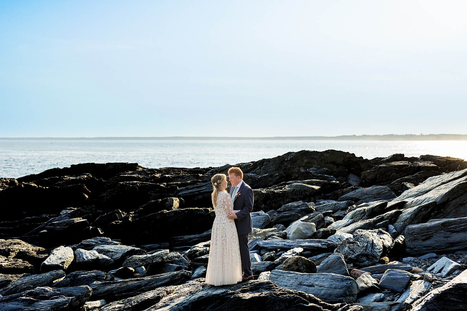 The bride and groom out on the rocks on Prout's Neck Maine