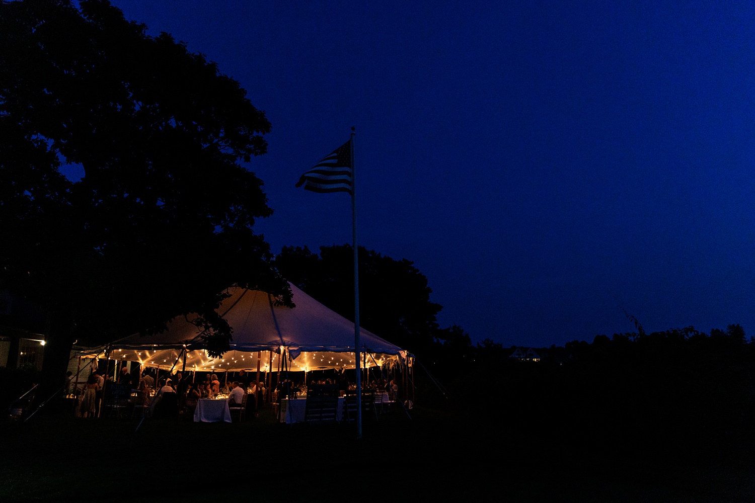 Prout's Neck Country Club lit up at night for the Maine wedding reception