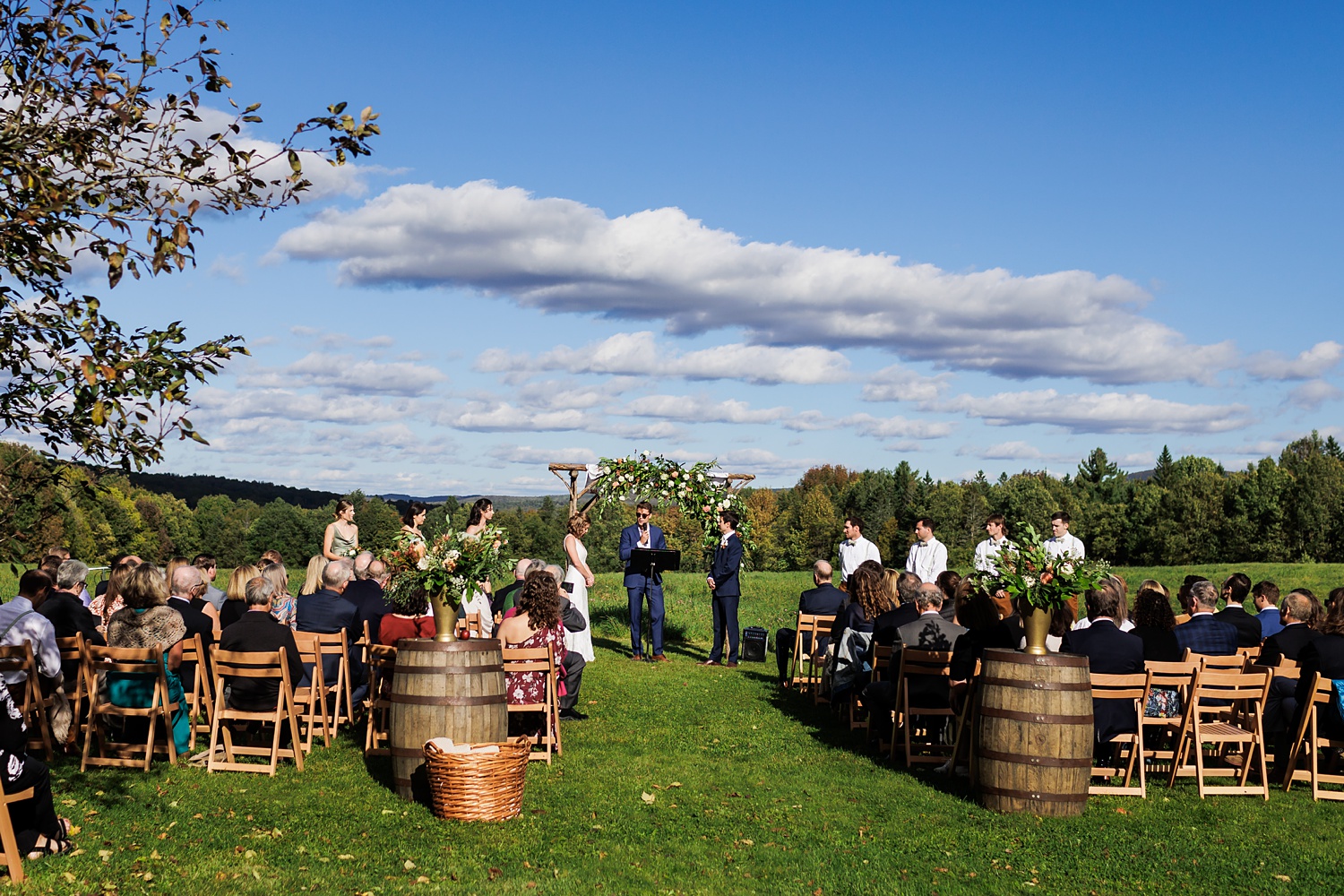 The wedding ceremony overlooking the mountains in fall in Vermont