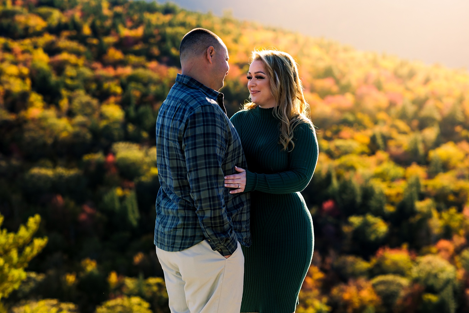The couple overlooking the fall views up at Cathedral Ledge in the White Mountains of NH