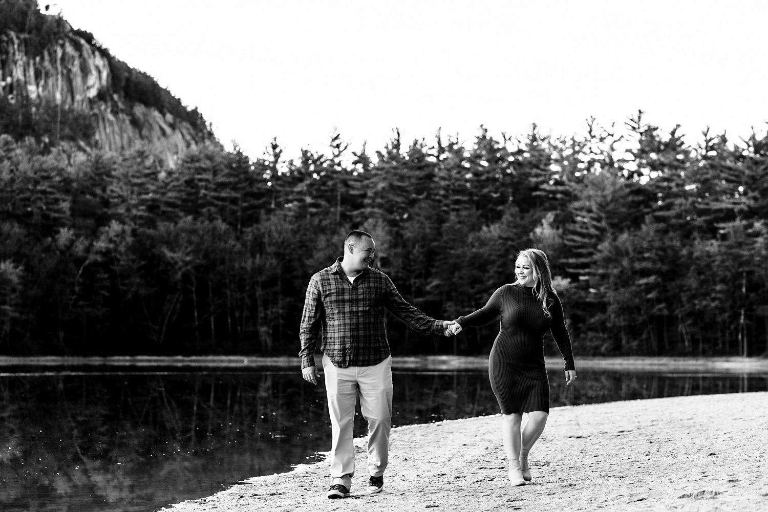 Laughing and walking at Echo Lake NH at fall