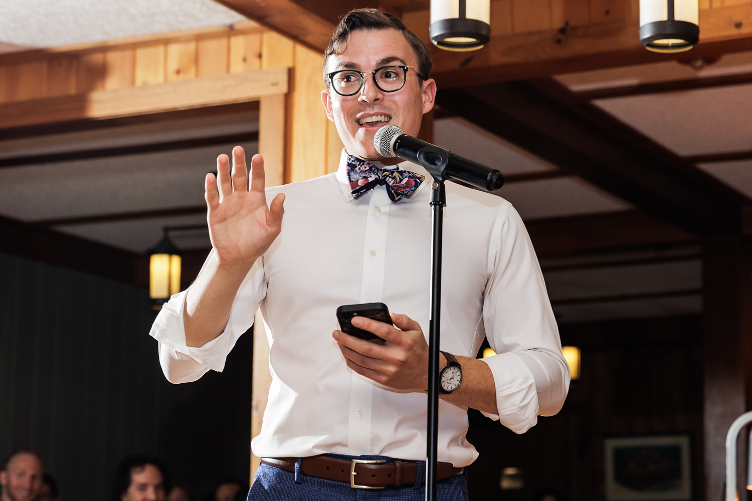 Groomsman gives an emotional toast at the wedding reception