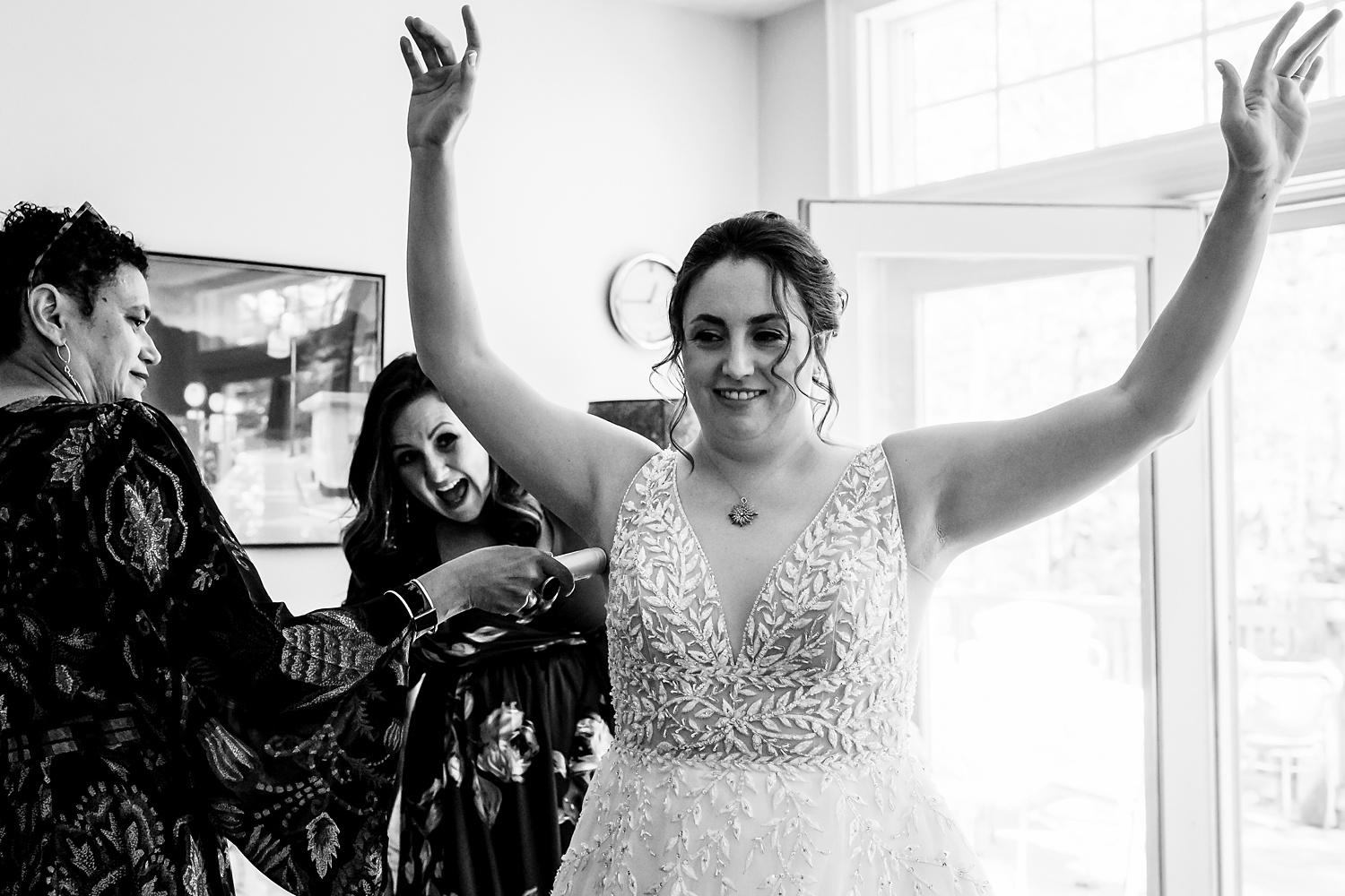 Family helps the bride get some deodorant on