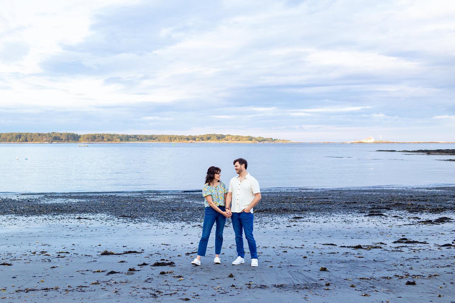 Engagement session on the cool beaches in New Hampshire