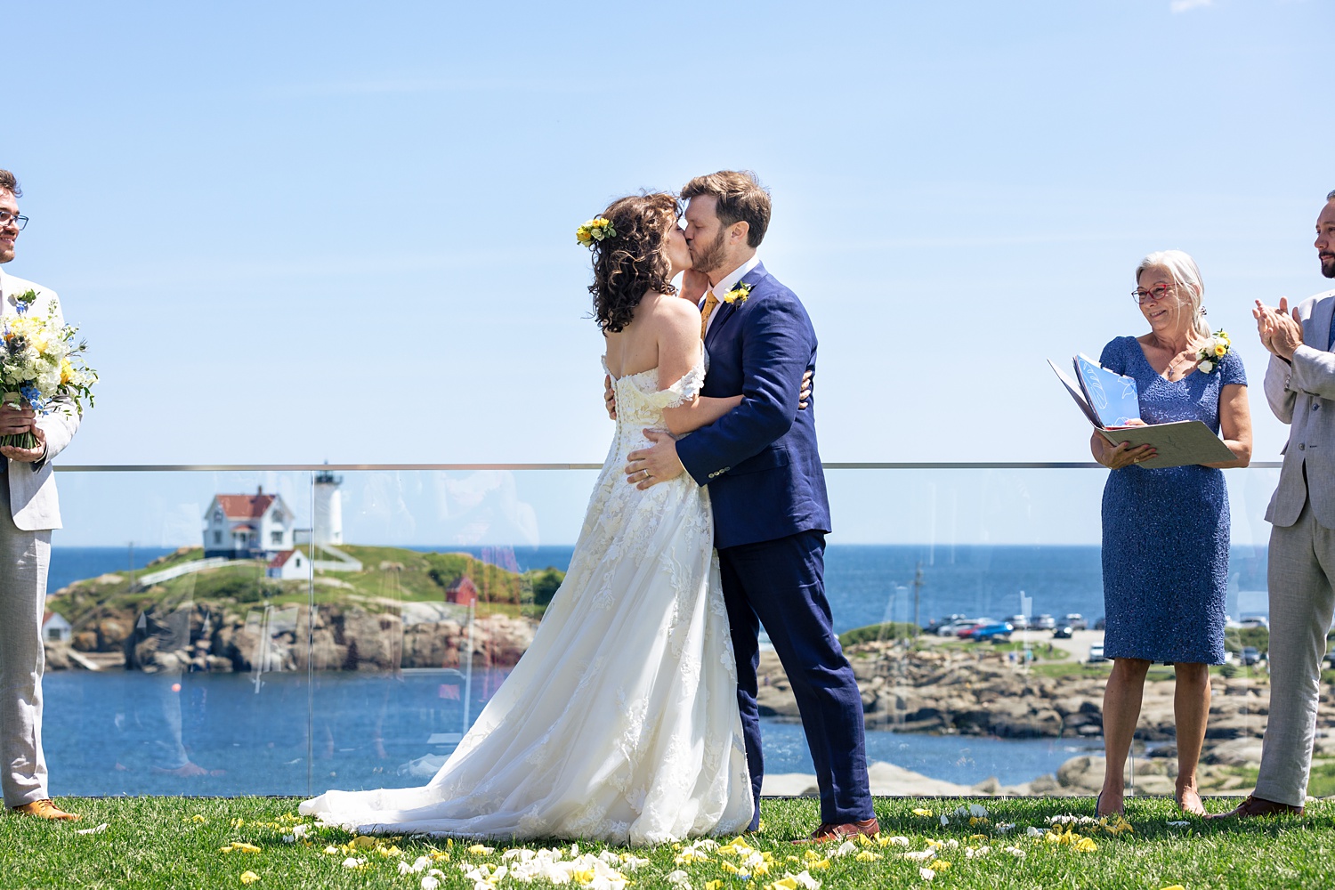 The first kiss at the end of the wedding ceremony at The Viewpoint Hotel in York Maine