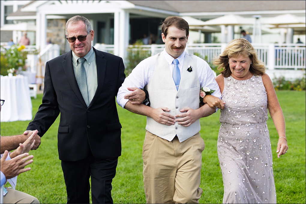 Emotional parents take the groom down the aisle